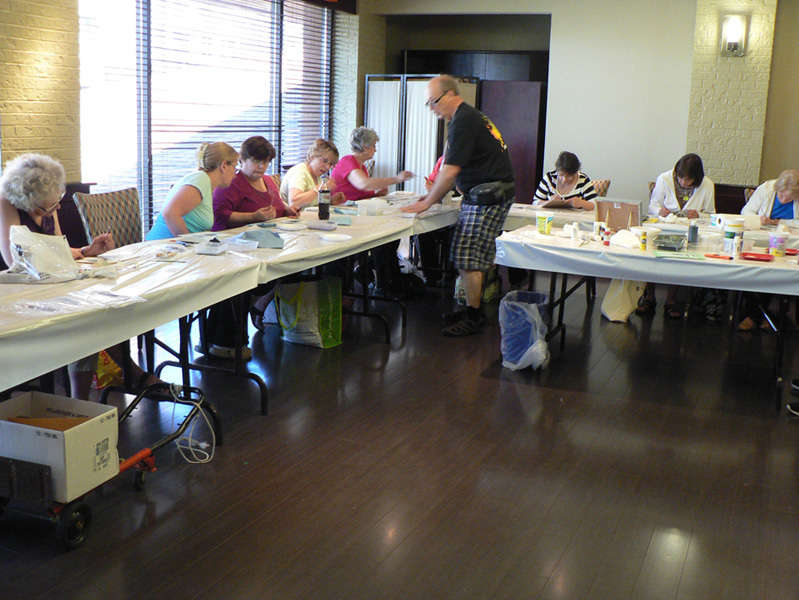 A painting class at a creative painting convention